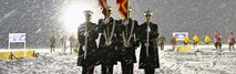 Marines From Recruiting Station Lansing, Recruiting Sub-Stations Grand Rapids North and South, participate in the opening ceremony for the Grand Rapids Pond Hockey Classic, Jan 25. The Marines braved sub-zero wind chill temperatures to present the colors on the frozen surface of Reeds Lake in Grand Rapids, Mich.