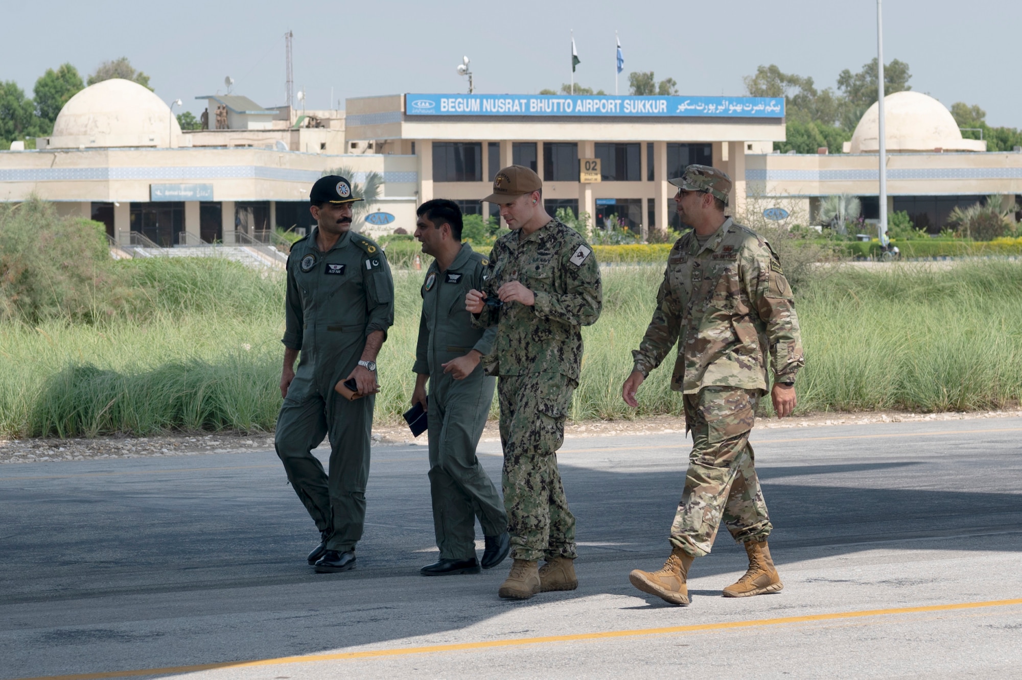 U.S. military personnel assigned to United States Central Command deliver equipment in support of a USAID-led humanitarian mission at Sukkur Airport, Pakistan, Sep 8, 2022. USAID leads the U.S. Government's international development and disaster assistance, helping people emerge from humanitarian crises, such as the catastrophic flooding currently plaguing Pakistan. This USAID-led delivery was the first of many to be distributed at several locations throughout the country.