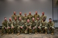 Approximately 10 Soldiers from Target Acquisition Platoon, Headquarters and Headquarters Battery, 65th Field Artillery Brigade, “America’s Thunder,”  are recognized during a departure ceremony Sept. 1, 2022, in the Scott Lundell Readiness Center auditorium at Camp Williams, Utah. The Soldiers will deploy in support of Operation Enduring Freedom under U.S. Africa Command.