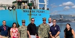 DLA leaders pose in from he Maersk Peary, one of three consolidated cargo, or CONSOL, capable ships located in Pearl Harbor, Hawaii