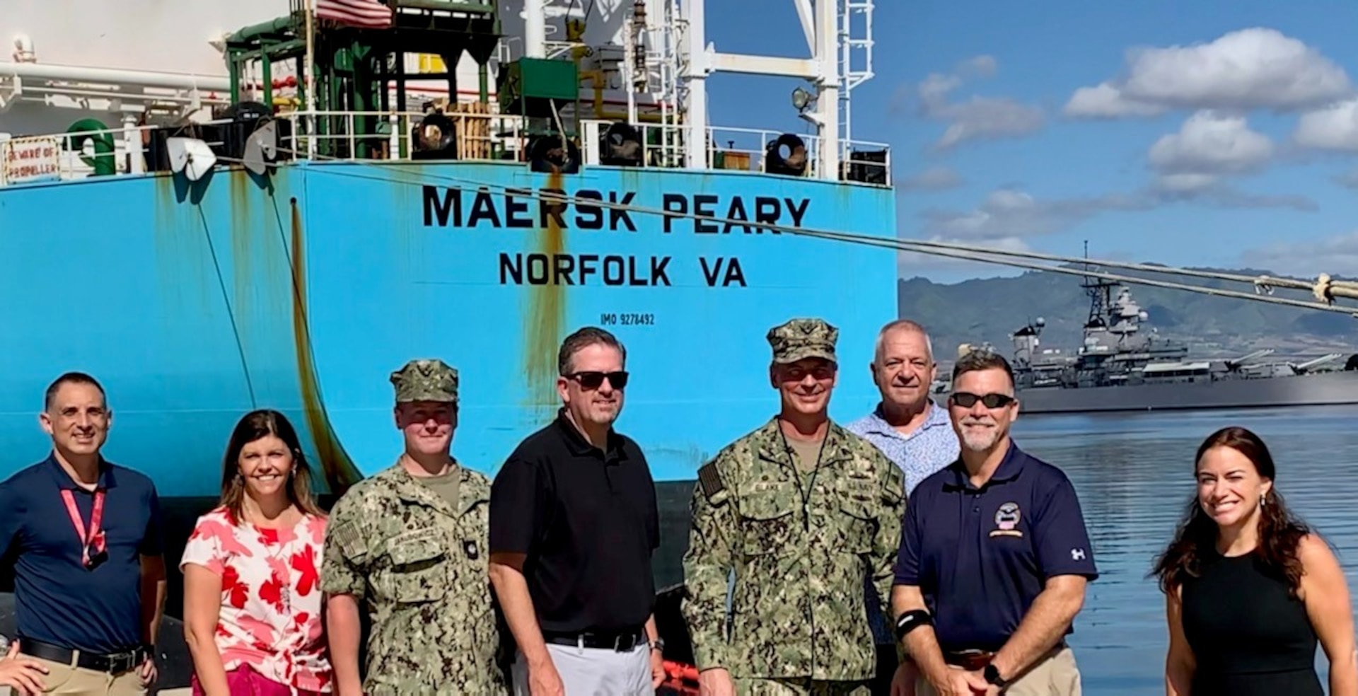 DLA leaders pose in from he Maersk Peary, one of three consolidated cargo, or CONSOL, capable ships located in Pearl Harbor, Hawaii