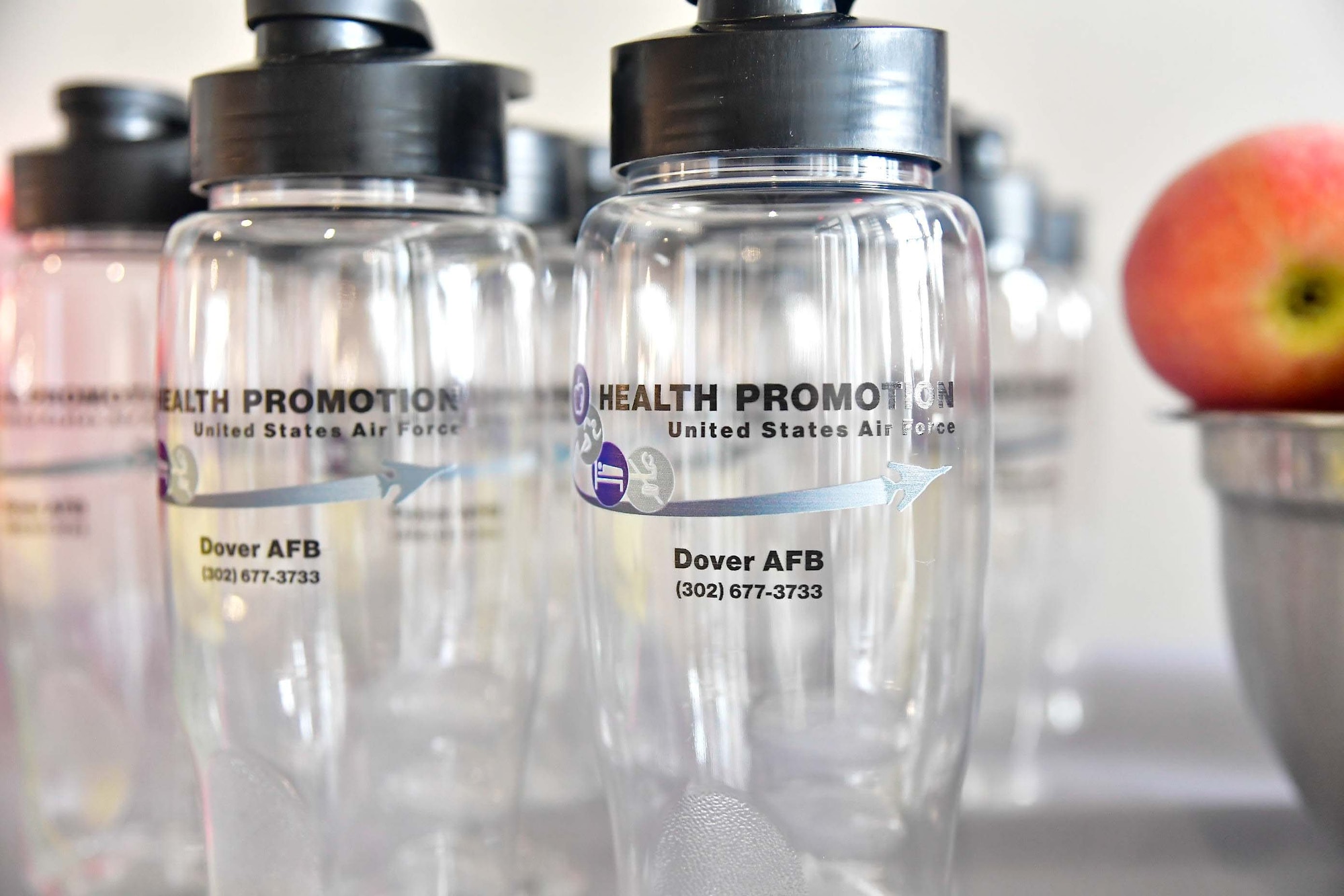 Water bottles sit at the entrance of the Human Performance and Wellness Event at Dover Air Force Base, Delaware, Sept. 8, 2022. Hosted by the 436th Operational Medical Readiness Squadron human performance flight, the event featured walk-in physical therapy appointments, glucose tests, a running clinic and booths from agencies around base. (U.S. Air Force photo by Senior Airman Faith Barron)