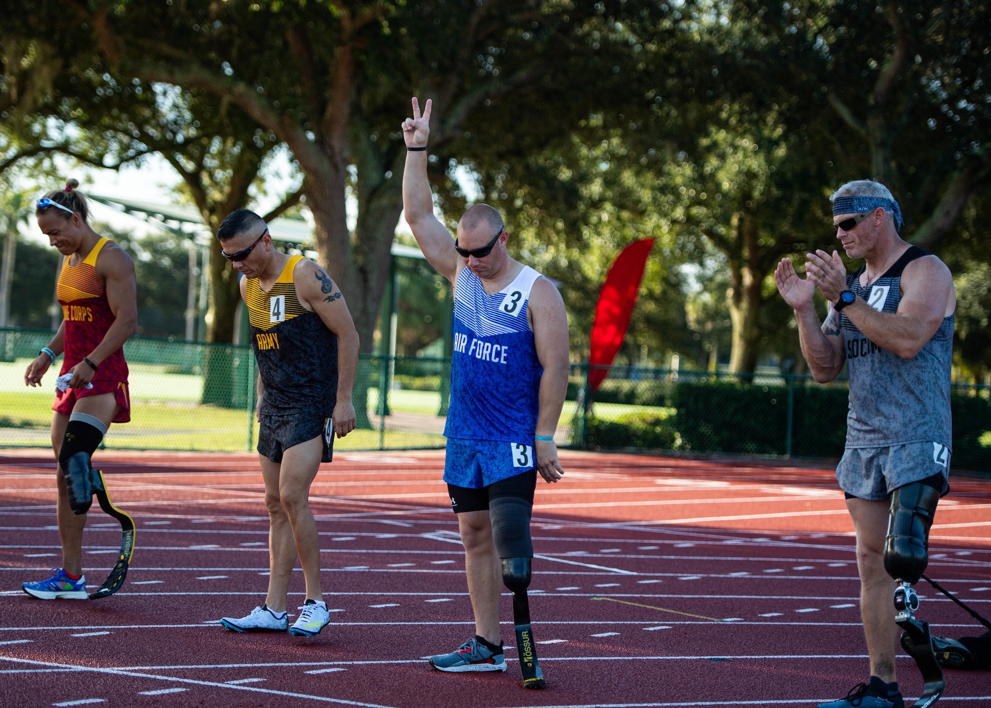 U.S. Air Force Senior MSgt. Benjamin Seekell, a Team Air Force Warrior Games athlete, poses at the starting line prior to a race during a track competition at the 2022 Department of Defense Warrior Games, August 25th, 2022, in Orlando, Florida.