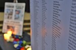 Banners show the names of terrorist attack victims.