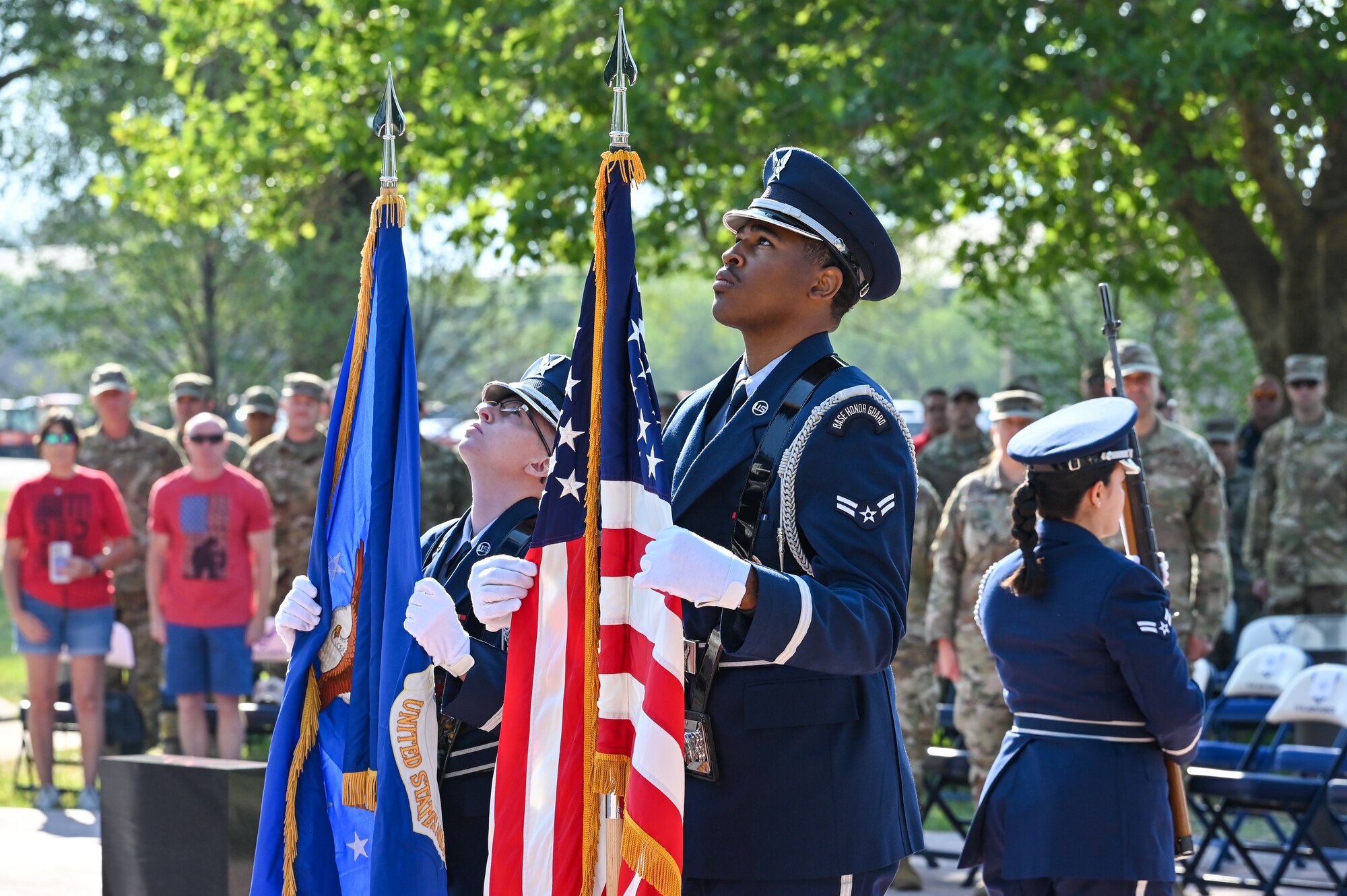 Honor Guard members Airman 1st Class Tamika Allen (left) and Airman 1st Class Mikah McNeal post the colors at the 9/11 Memorial Ceremony Sept. 9, 2022