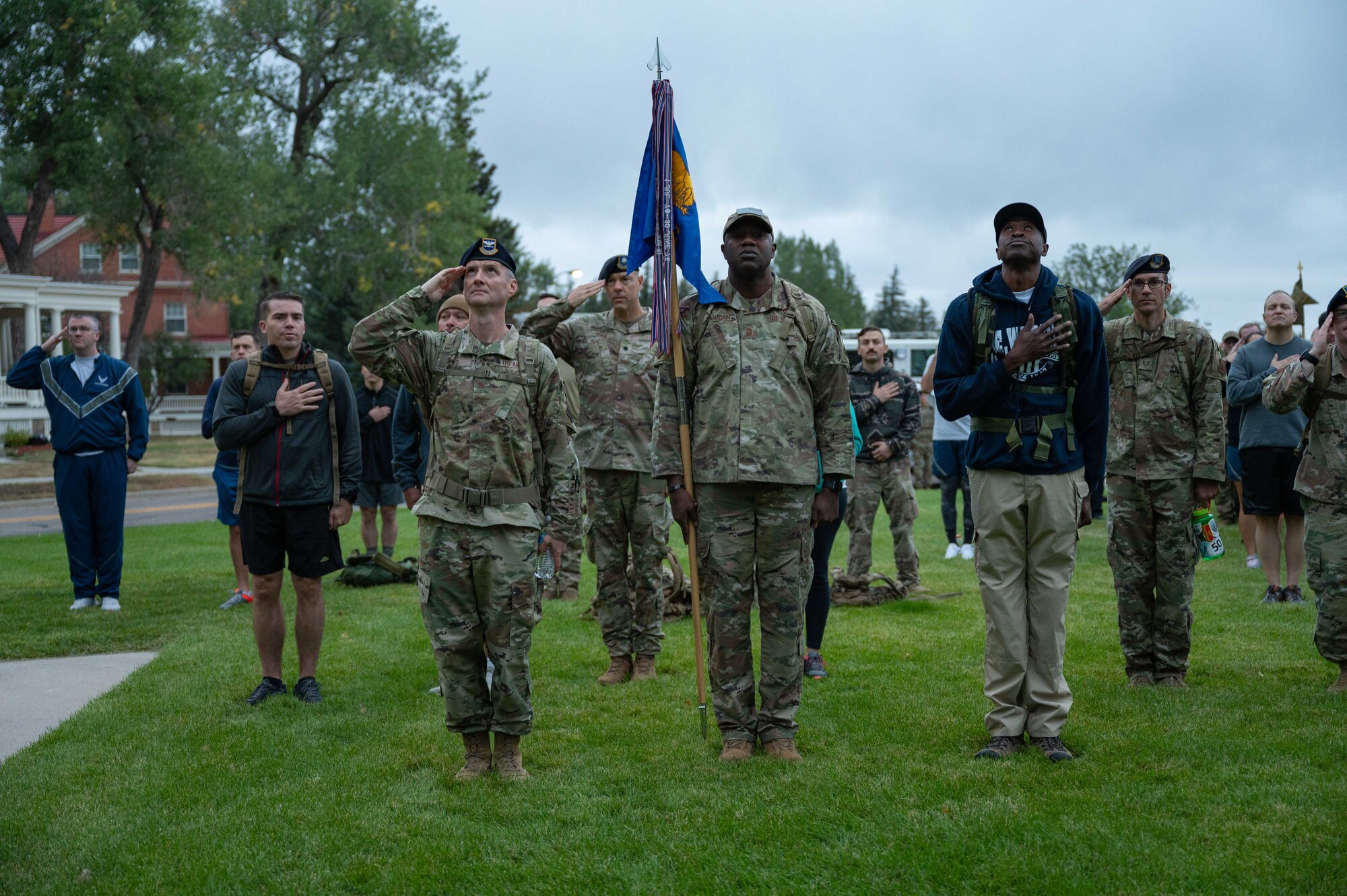 Airmen in 90th Missile Wing participate in a 9/11 ceremony and  ruck march.