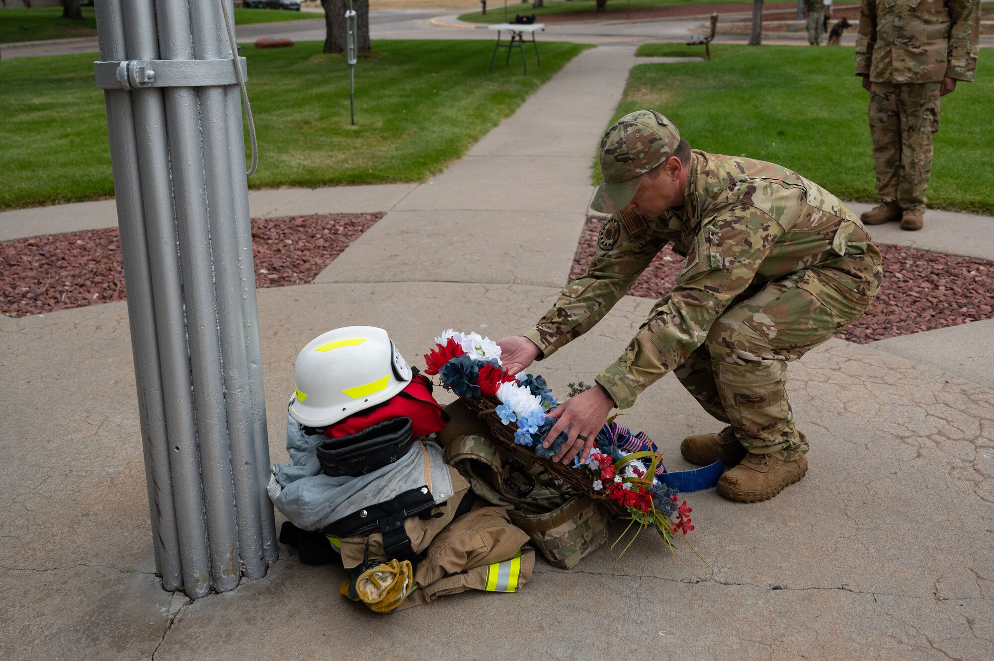 Airmen in 90th Missile Wing participate in a 9/11 ceremony and  ruck march.