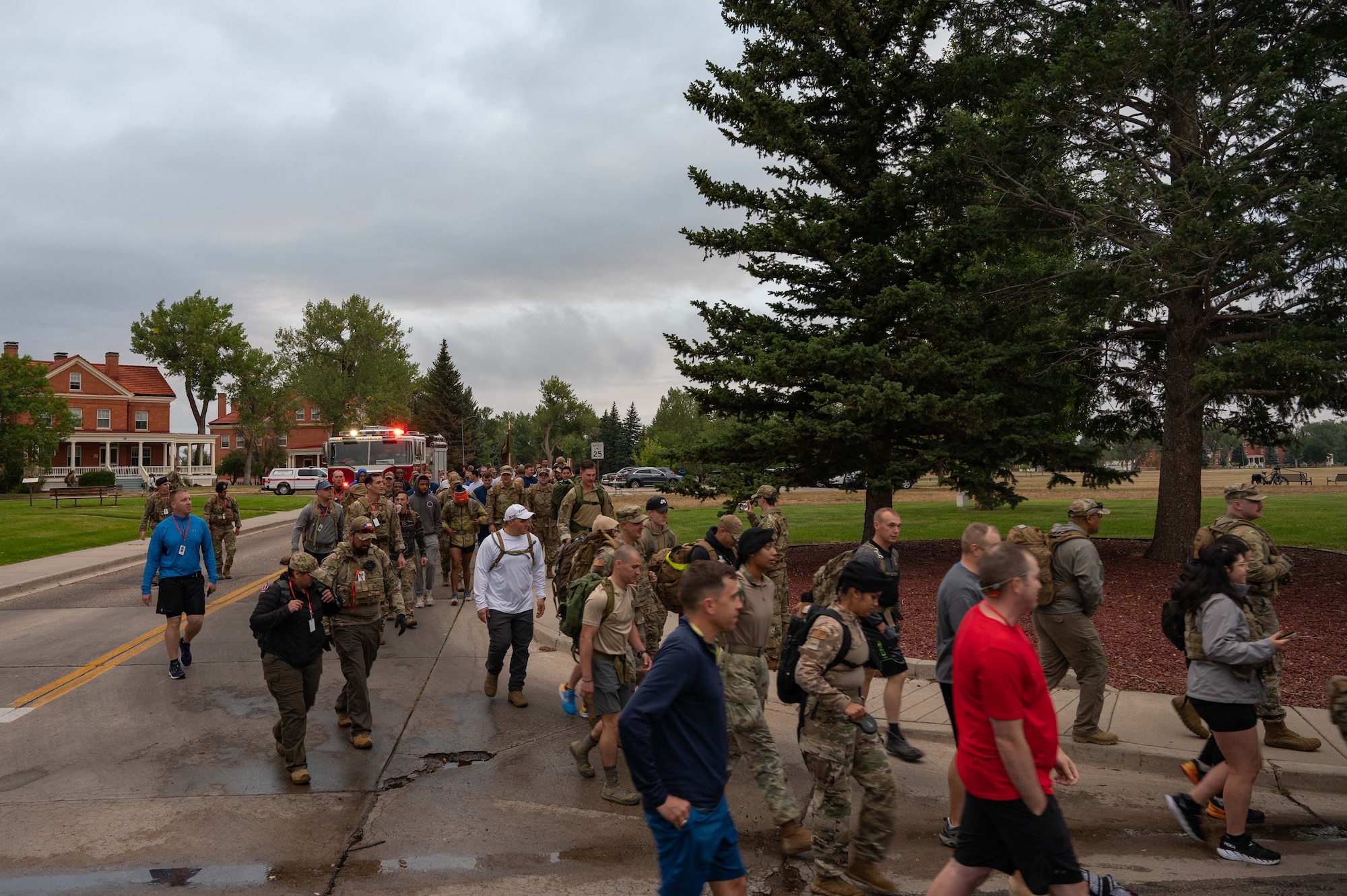 Airmen in 90th Missile Wing participate in a 9/11 ceremony and  ruck march.