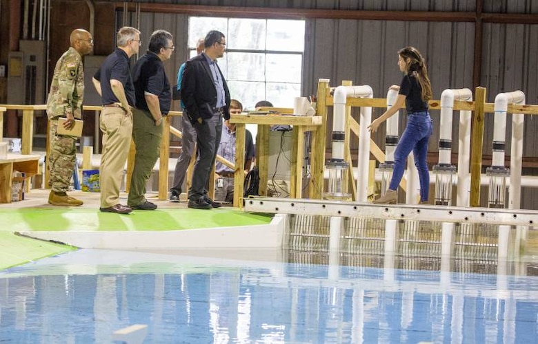 Project lead Kiara Pazan briefs Assistant Secretary of the Army for Civil Works Michael Connor on testing methods used to identify existing hydraulic conditions in the pumps.