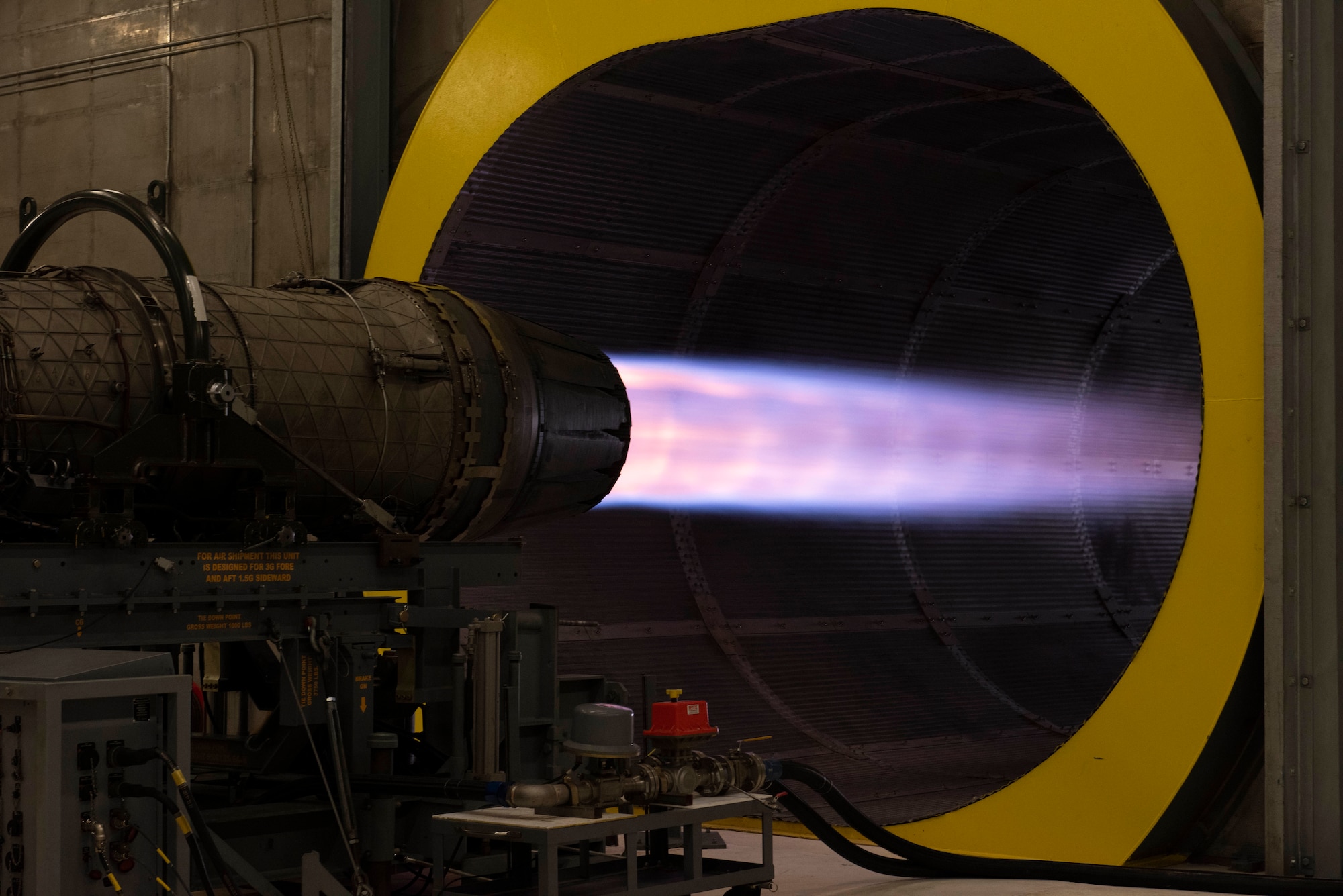 Airmen from the 49th Component Maintenance Squadron conduct a test run on a Pratt & Whitney F100 turbofan engine in the hush house at Holloman Air Force Base, New Mexico, Sept. 6, 2022. The hush house is a safe, enclosed safe designed to facilitate aircraft engine testing. (U.S. Air photo by Airman 1st Class Isaiah Pedrazzini)