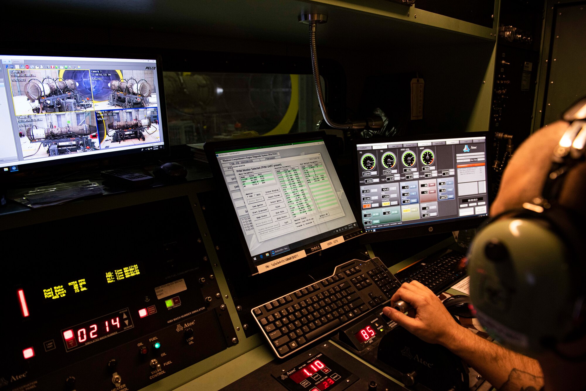 U.S. Air Force Tech. Sgt. Stephen Baudo, 49th Component Maintenance Squadron test cell section chief, operates in the engine ‘cab’ at Holloman Air Force Base, New Mexico, Sept. 6, 2022. The operator in the engine cab ensures the engine is running safely and at full capacity. (U.S. Air photo by Airman 1st Class Isaiah Pedrazzini)