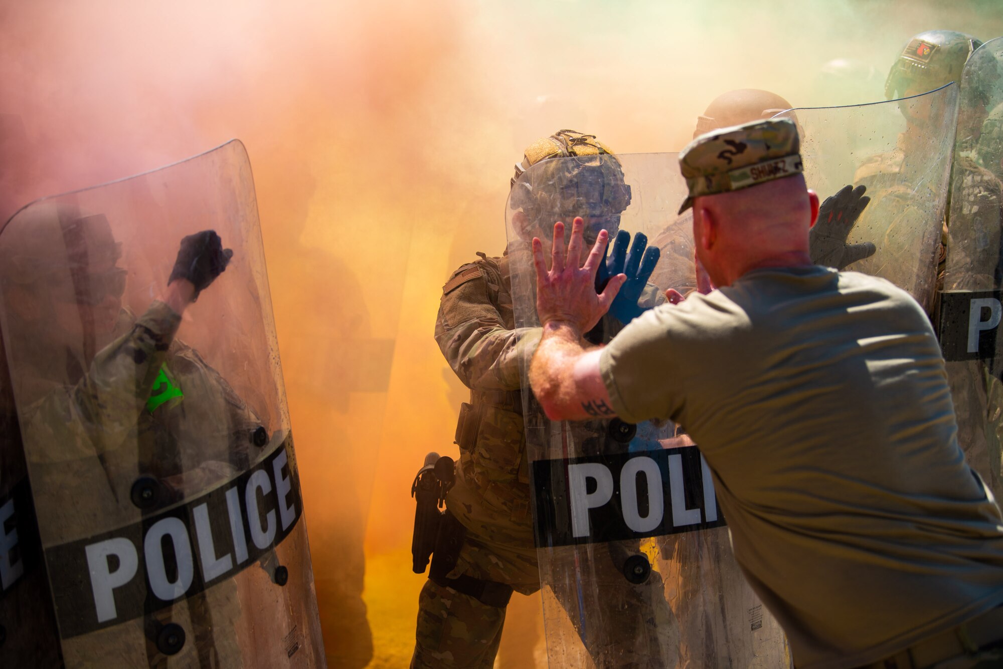 Members of the Kentucky Air National Guard’s 123rd Security Forces Squadron hold off aggressors during a riot-control exercise at Camp San Luis Obispo, Calif., May 18, 2022. The event was part of law-and-order training completed by more than 20 unit members over six days in central California. (U.S. Air National Guard photo by Phil Speck)