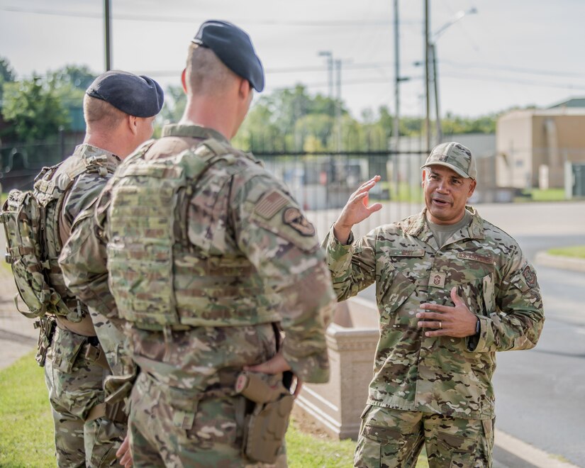 Command Chief Master Sgt. Steven Best engages with service members from the 123rd Airlift Wing, after assuming the role of wing command chief for the Kentucky Air National Guard in Louisville, Ky., May 3, 2022. Best has served with the wing since 1998 in the 123rd Logistics Readiness Squadron, and was awarded First Sergeant of the Year for the wing in 2015. (U.S. Air National Guard photo by Staff Sgt. Chloe Ochs)