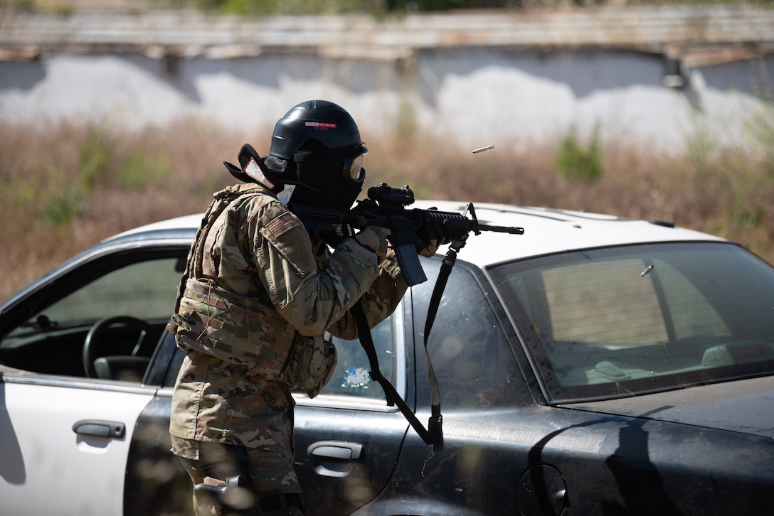 A member of the Kentucky Air National Guard’s 123rd Security Forces Squadron fires his service rifle during an exercise at Camp San Luis Obispo, Calif., May 19, 2022. The event was part of law-and-order training completed by more than 20 unit members over six days in central California. (U.S. Air National Guard photo by Phil Speck)