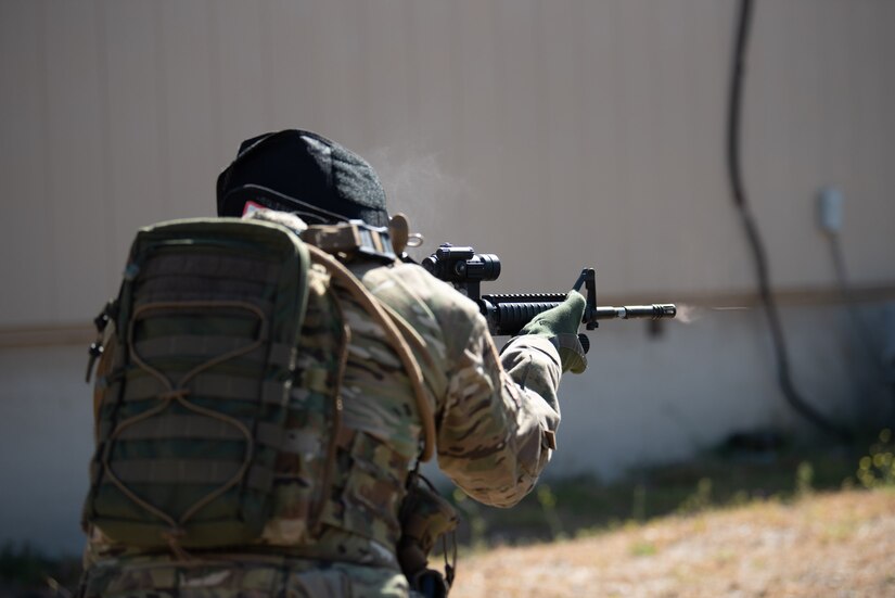 A member of the Kentucky Air National Guard’s 123rd Security Forces Squadron fires his service rifle during an exercise at Camp San Luis Obispo, Calif., May 19, 2022. The event was part of law-and-order training completed by more than 20 unit members over six days in central California. (U.S. Air National Guard photo by Phil Speck)