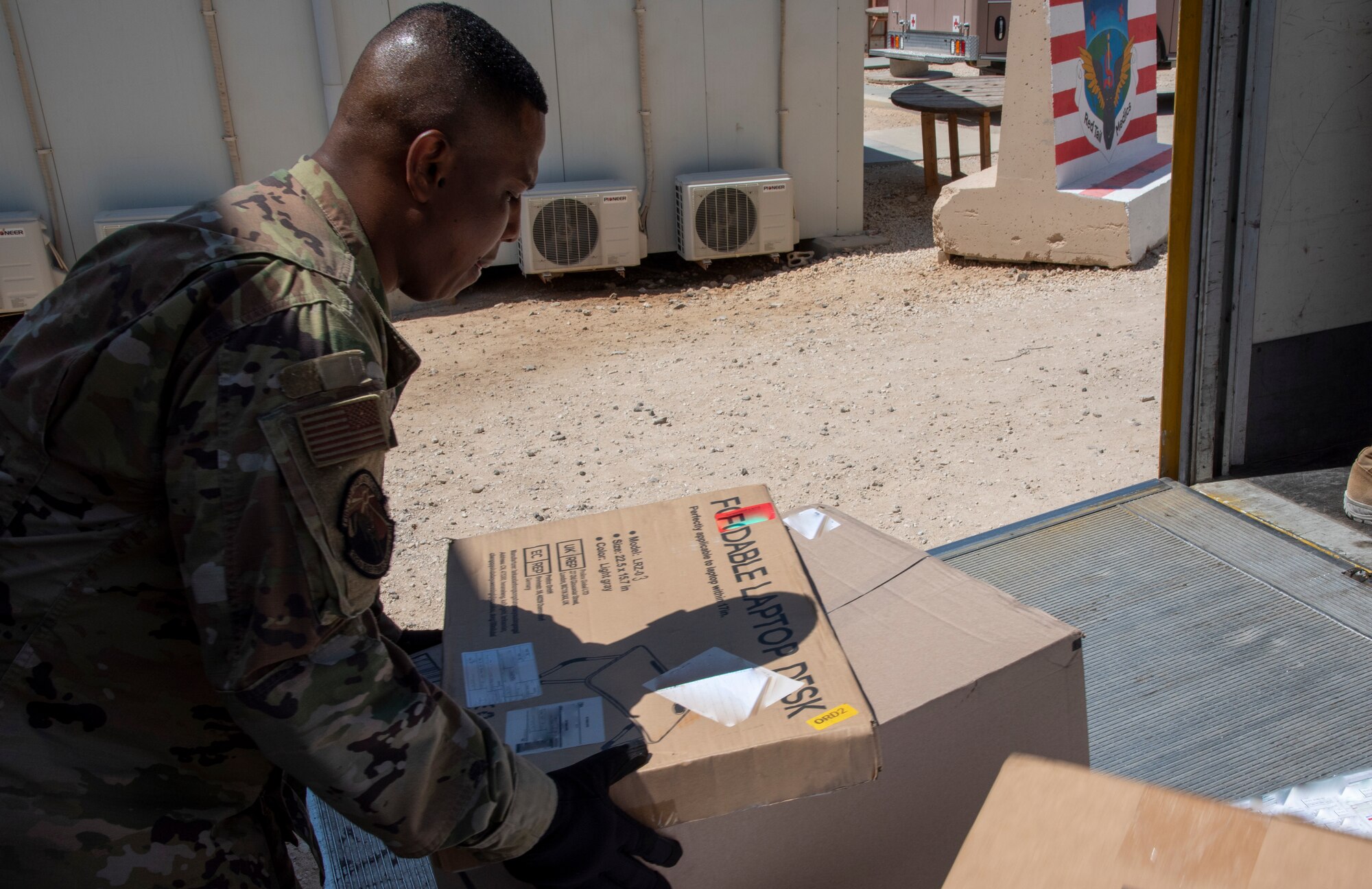 Volunteers and postal workers with the 332d Air Expeditionary Wing process incoming shipments at an undisclosed location in Southwest Asia, August 23, 2022. Each package must be inspected and sorted to make sure it gets to the right person. (U.S. Air Force photo by: Tech. Sgt. Jim Bentley)