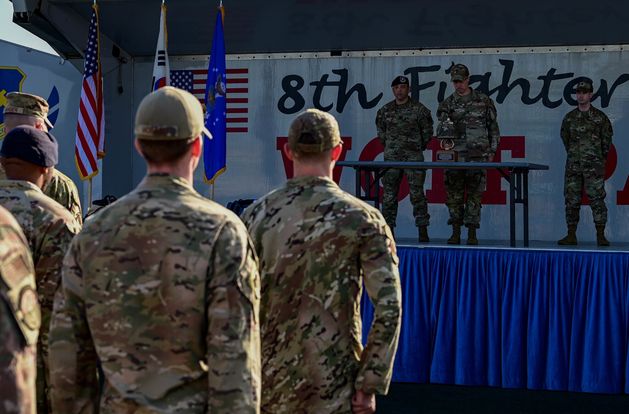 Lt. Col. John “Devil” Marshall, 8th Civil Engineer Squadron commander, rings a ceremonial bell during a 9/11 remembrance ceremony at Kunsan Air Base, Republic of Korea, Sept. 8, 2022. To firefighters, the mournful ringing of the bell signifies the passing of a comrade. (U.S. Air Force photo by Senior Airman Shannon Braaten)