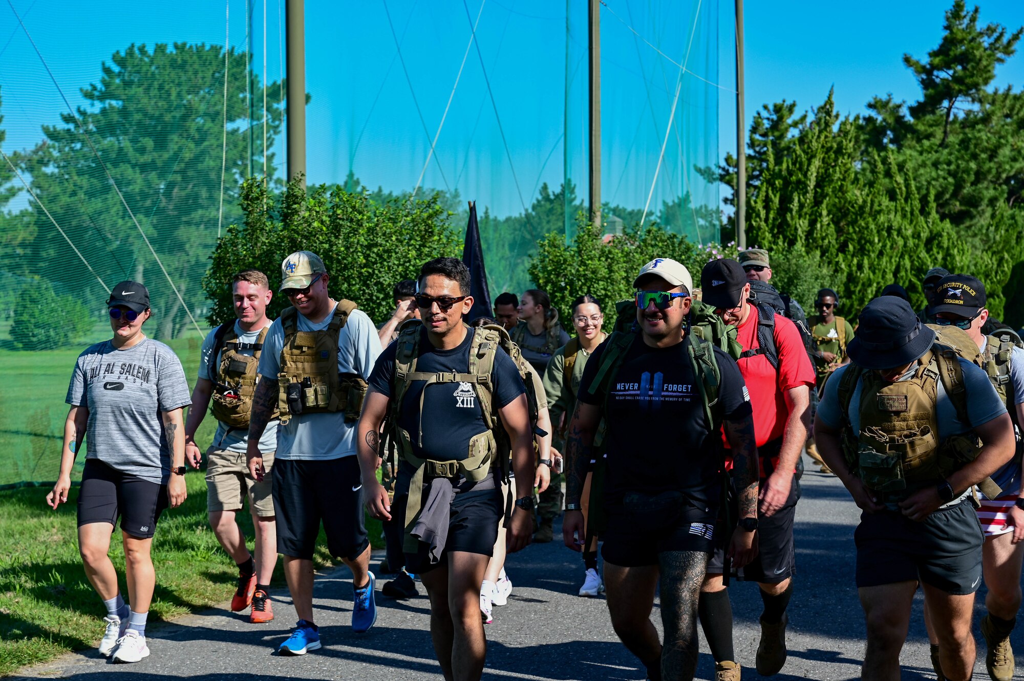 Service members participate in a ruck march as part of a 9/11 remembrance ceremony at Kunsan Air Base, Republic of Korea, Sept. 8, 2022. During the ruck march, service members reflected on and honored those who lost their lives Sept. 11, 2001. (U.S. Air Force photo by Senior Airman Shannon Braaten)