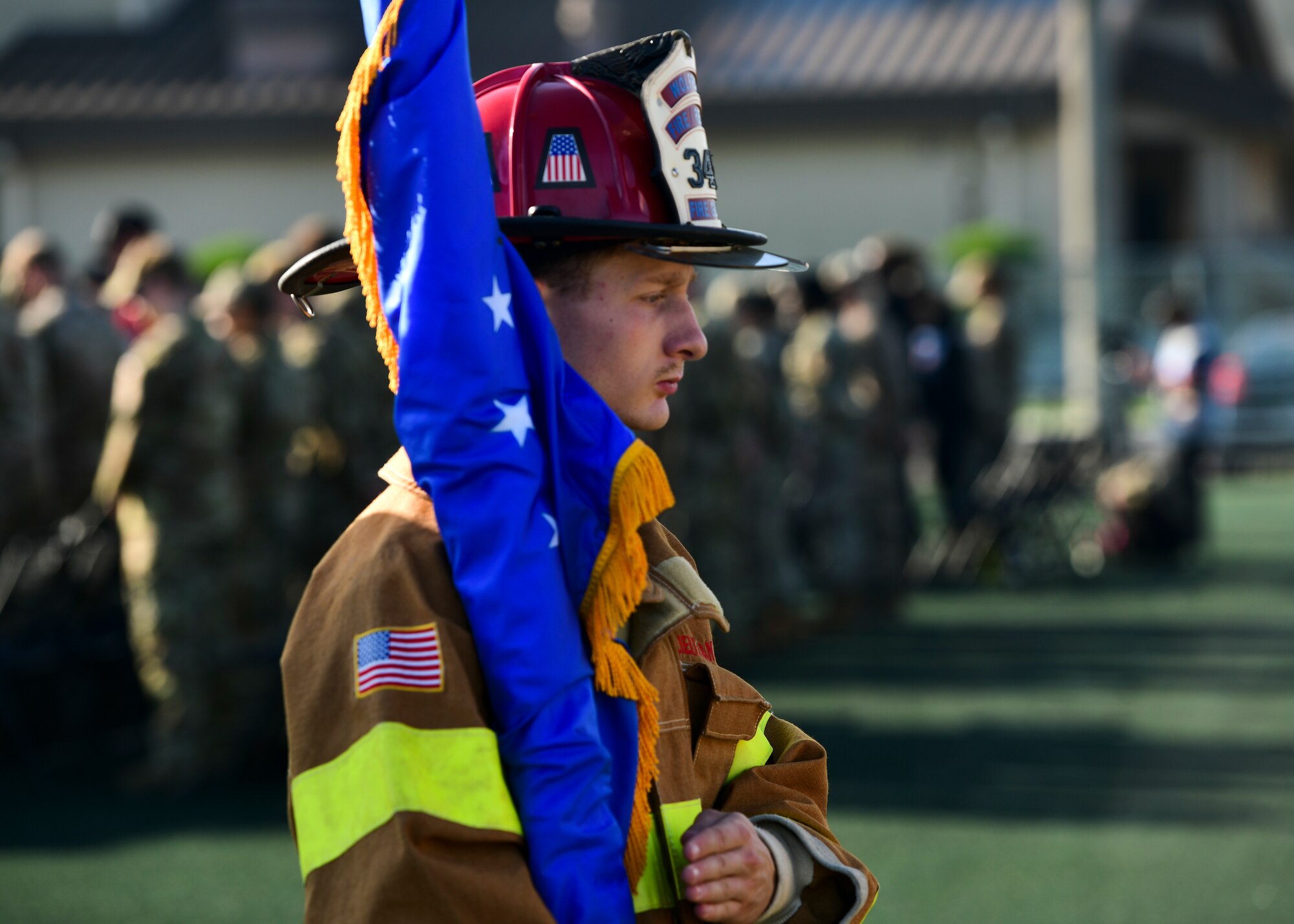 An 8th Civil Engineer Squadron honor guard member carries the U.S. Air Force flag during a 9/11 remembrance ceremony at Kunsan Air Base, Republic of Korea, Sept. 8, 2022. Each year, the 8th Fighter Wing reflects on the tragic events that occured on Sept. 11, 2001 and pays tribute to all the lives lost that day. (U.S. Air Force photo by Staff Sgt. Isaiah J. Soliz)