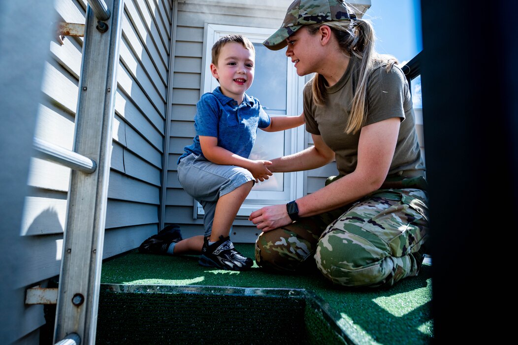 Airmen and families participating in family day.
