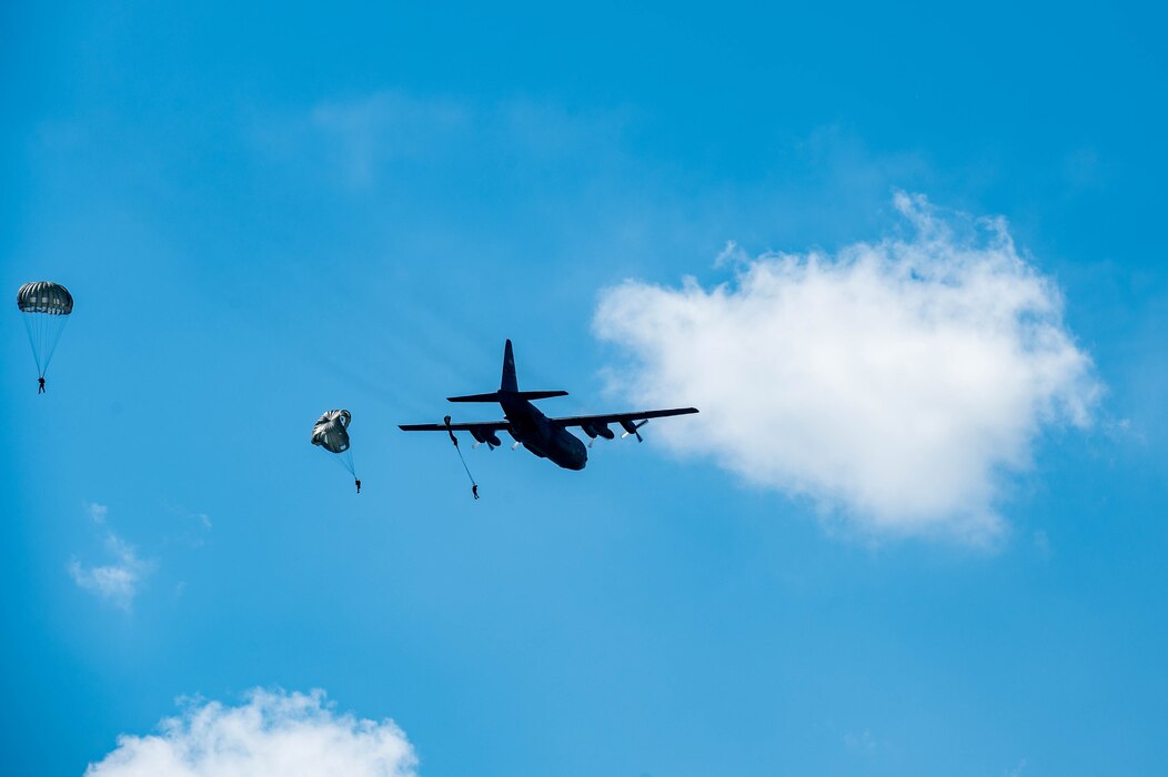 TACPs parachuting from aircraft.