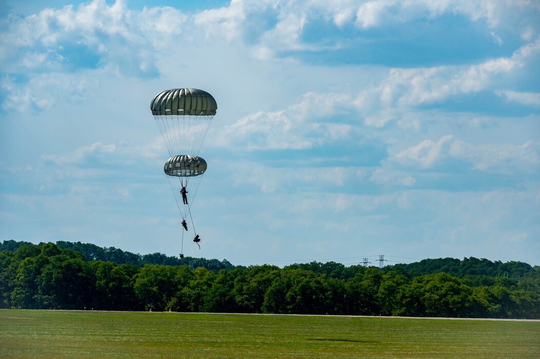 TACPs parachuting from aircraft.