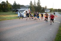 Competitors begin race up Mt. Mansfield Toll Road.