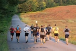 Competitors begin race up Mt. Mansfield Toll Road.