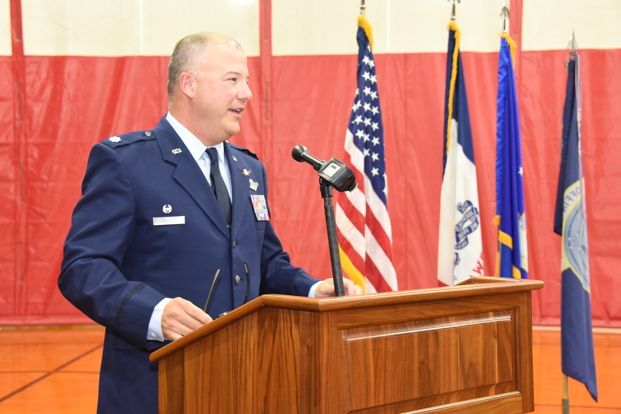 Lt. Col. Kolacia speaks behind a podium