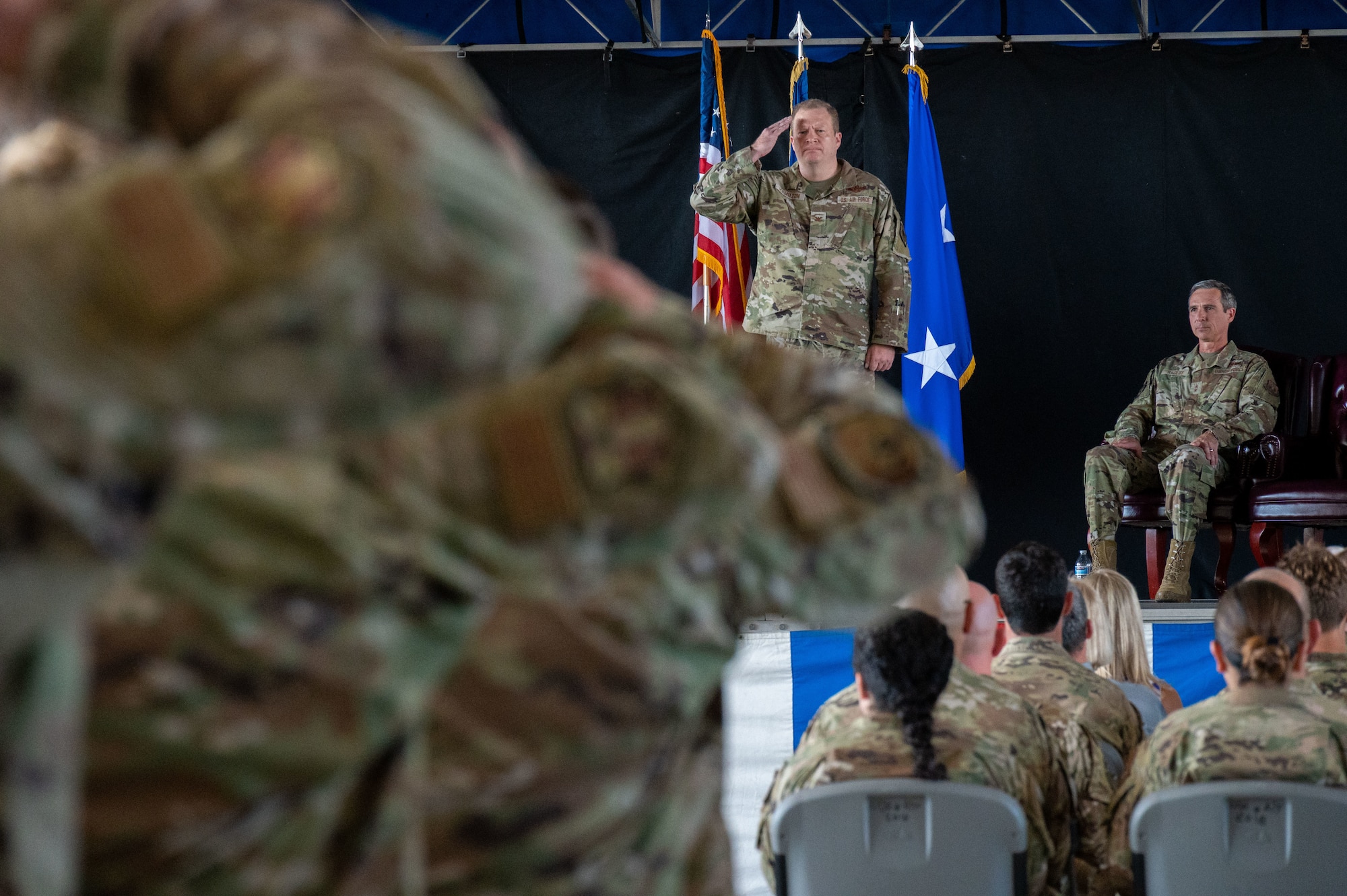 Col. Jesse Hamilton, 920th Rescue Wing commander, renders his first salute to 920th RQW Airmen during a change of command ceremony, Sept. 11, 2022 at Patrick Space Force Base, Florida. The change of command is a military tradition that formally signifies the transfer of responsibility and authority from one commanding officer to another; symbolized through the passing of a guidon.(U.S. Air Force photo by Master Sgt. Kelly Goonan)