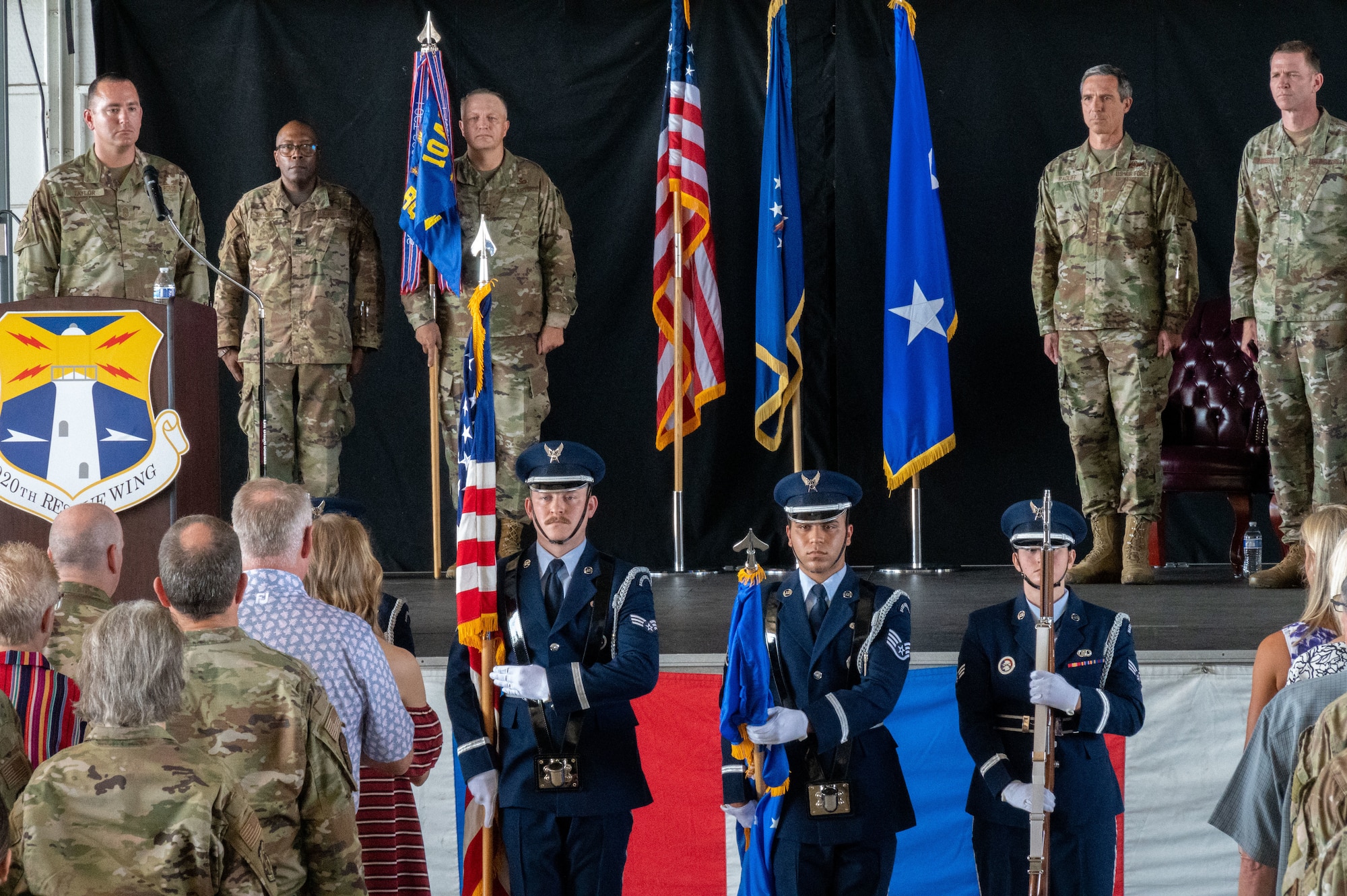 The 920th Rescue Wing honor guard present the colors during a change of command ceremony, Sept. 11, 2022, at Patrick Space Force Base, Florida. The change of command is a military tradition that formally signifies the transfer of responsibility and authority from one commanding officer to another; symbolized through the passing of a guidon. (U.S. Air Force photo by Master Sgt. Kelly Goonan)