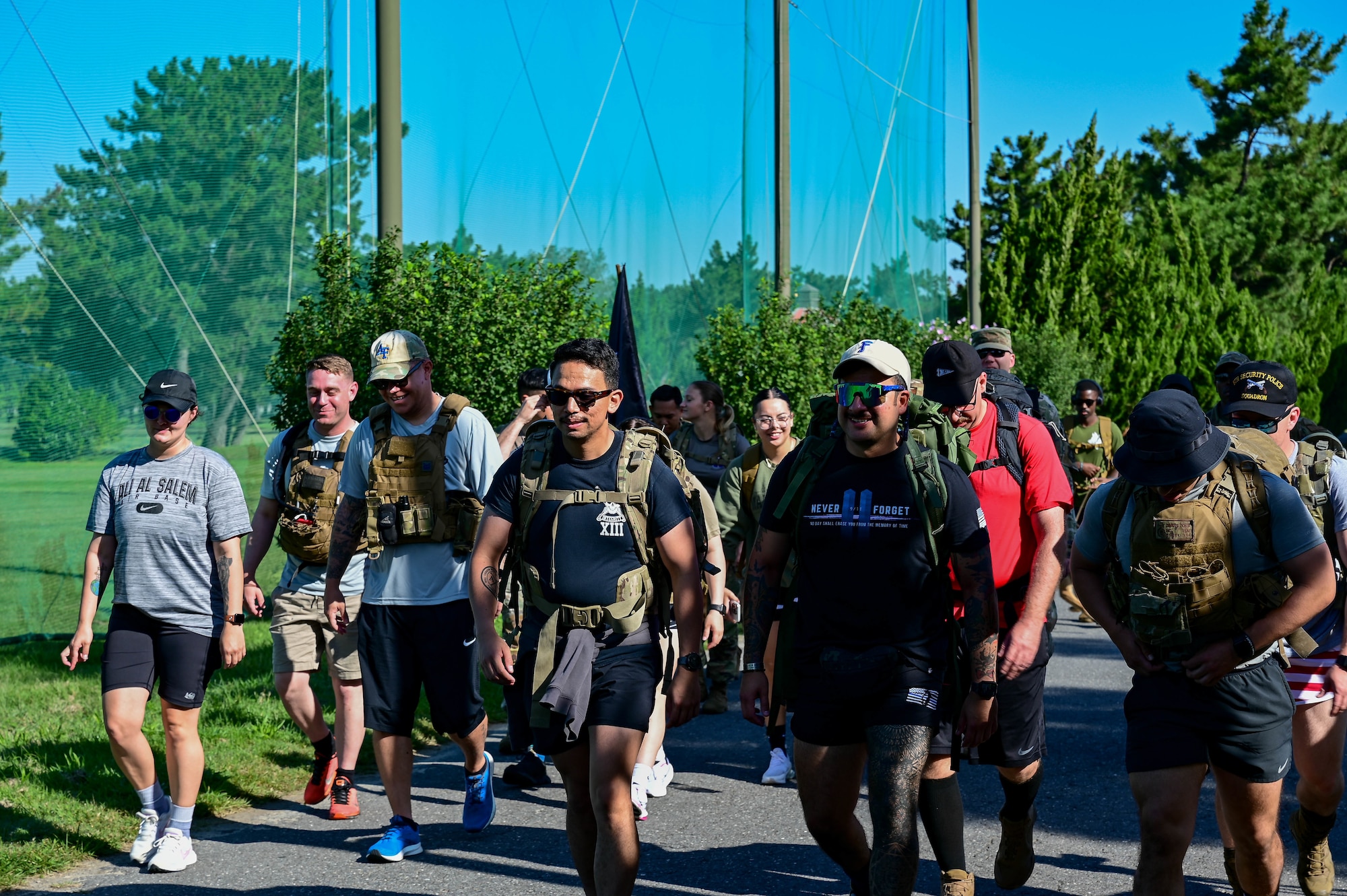 Service members participate in a ruck march as part of a 9/11 remembrance ceremony at Kunsan Air Base, Republic of Korea, Sept. 8, 2022. During the ruck march, service members reflected on and honored those who lost their lives Sept. 11, 2001. (U.S. Air Force photo by Senior Airman Shannon Braaten)