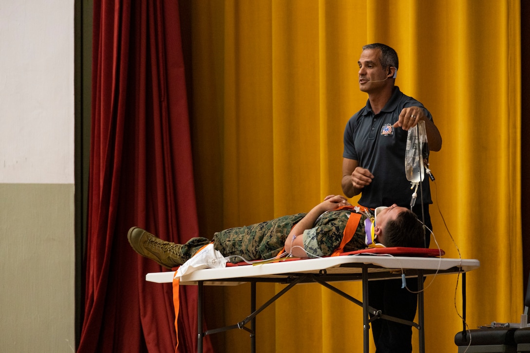 Oscar Duran, a firefighter paramedic and presenter with Florida’s Stay Alive from Education team, lists the injuries that can result from a car accident during a presentation on Camp Foster, Okinawa, Japan, Sept. 1, 2022. Presenters with Stay Alive from Education provided “Street Smart” training to Marines to raise awareness of the consequences of unsafe driving. The SAFE team is a group of firefighters and paramedics that performed an interactive presentation to educate audiences on car accident scenarios. (U.S. Marine Corps photo by Lance Cpl. Thomas Sheng)