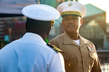 U.S. Marine Corps Lt. Gen. Brian W. Cavanaugh, right, the commanding general of Fleet Marine Force, Atlantic, Marine Forces Command, Marine Forces Northern Command, meets Cdr. Alfonza O. White, left, the commanding officer of the USS Minneapolis-St. Paul (LCS 21) during a ship tour in Baltimore, Maryland, Sept. 9, 2022. Maryland Fleet Week & Flyover Baltimore is an annual public event that celebrates the contributions of the U.S. sea services and maritime capabilities from the U.S. Marine Corps, U.S. Navy and U.S. Coast Guard. More than 2,300 service members participated in Maryland Fleet Week & Flyover Baltimore 2022 engaging and assisting with ship tours, live bands and static equipment displays. (U.S. Marine Corps photo by Lance Cpl. Angel Alvarado)