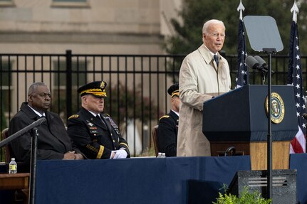 President Joe Biden speaks from a lectern.