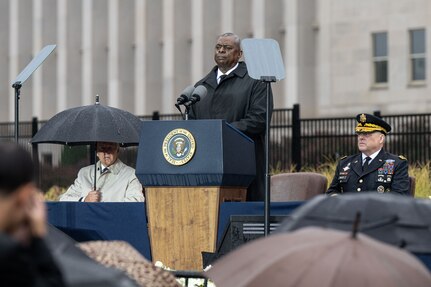 Defense Secretary Lloyd J. Austin III speaks at a lectern.