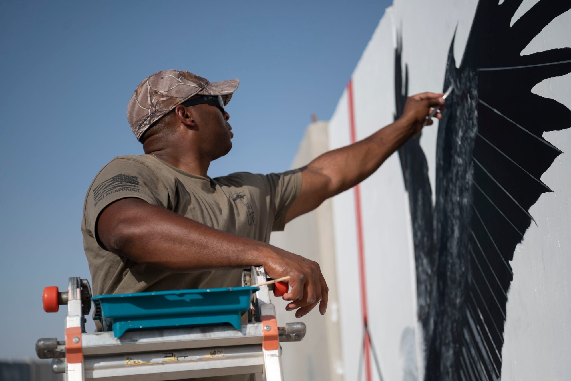 The 332d Air Expeditionary Wing honors those lives lost during the September 11 terrorist attacks in 2001. The 332d AEW held a 24 hour stair climb, the “Run to Remember” 5k, an unveiling of a 9/11 themed T-wall, Emergency Services interactive display, a flyover, cookout, 9/11 themed movie night and a memorial ceremony that showed a screening of a documentary  showcasing the sequence of events during the attacks. (U.S. Air Force photo by Tech. Sgt. Jeffery Foster)