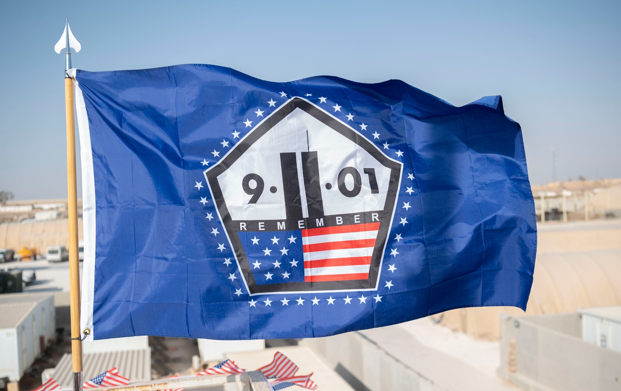 The 332d Air Expeditionary Wing honors those lives lost during the September 11 terrorist attacks in 2001. The 332d AEW held a 24 hour stair climb, the “Run to Remember” 5k, an unveiling of a 9/11 themed T-wall, Emergency Services interactive display, a flyover, cookout, 9/11 themed movie night and a memorial ceremony that showed a screening of a documentary  showcasing the sequence of events during the attacks. (U.S. Air Force photo by Tech. Sgt. Jeffery Foster)