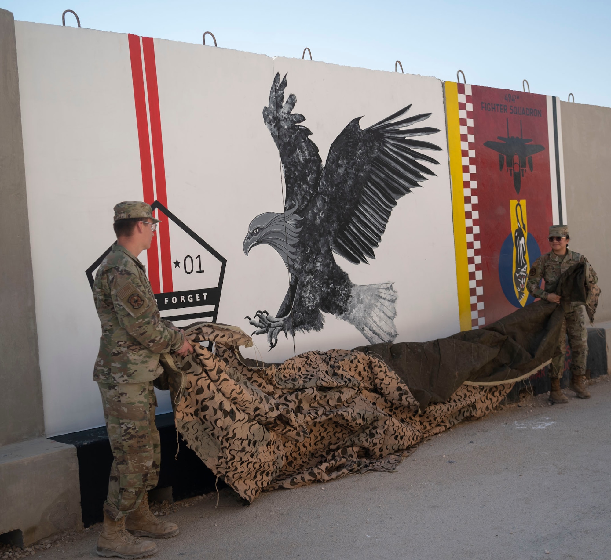 The 332d Air Expeditionary Wing honors those lives lost during the September 11 terrorist attacks in 2001. The 332d AEW held a 24 hour stair climb, the “Run to Remember” 5k, an unveiling of a 9/11 themed T-wall, Emergency Services interactive display, a flyover, cookout, 9/11 themed movie night and a memorial ceremony that showed a screening of a documentary  showcasing the sequence of events during the attacks. (U.S. Air Force photo by Tech. Sgt. Jeffery Foster)