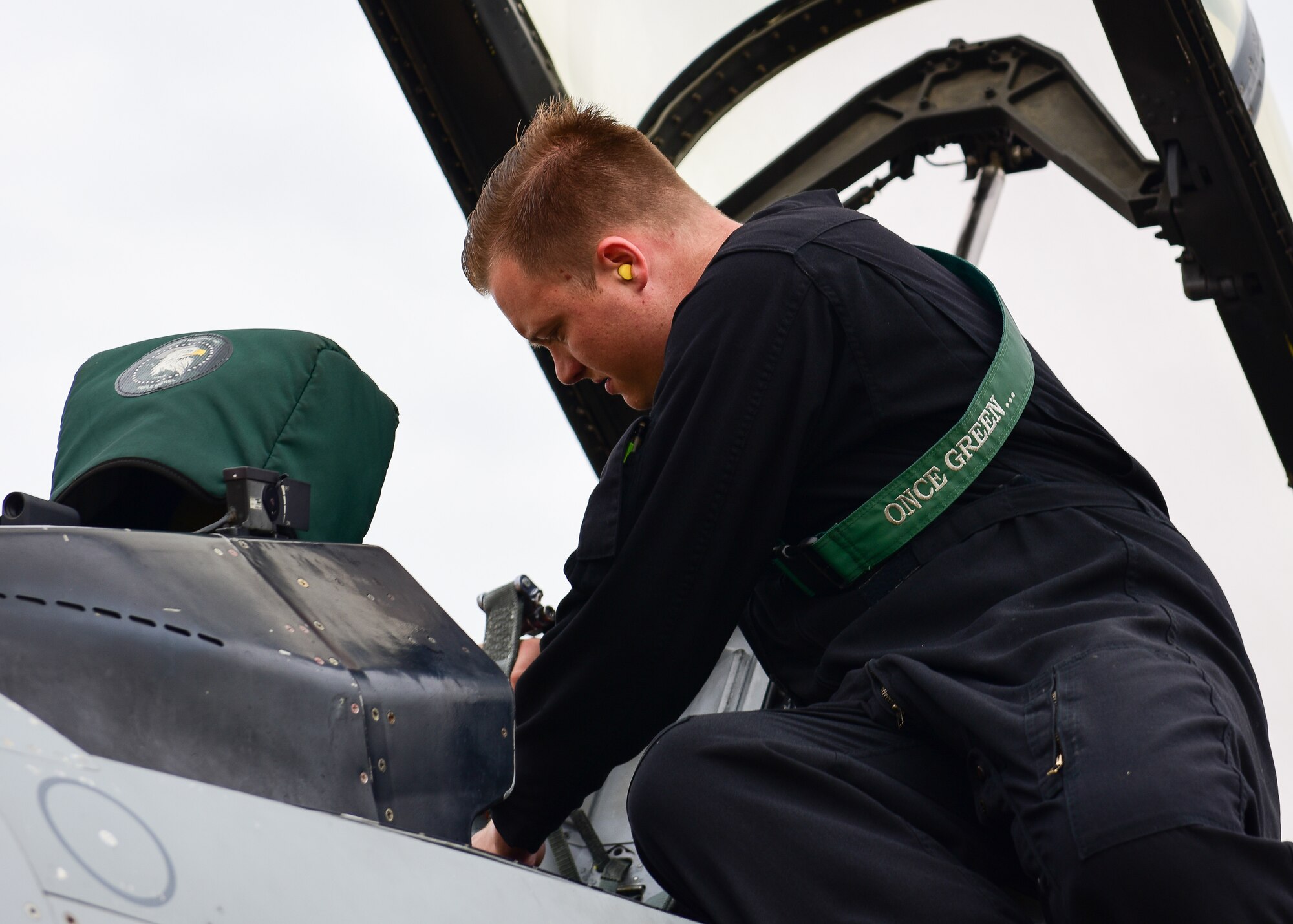 Senior Airman William Howell, 555th Fighter Generation Squadron crew chief from the 31st Fighter Wing, Aviano Air Base, Italy, services the cockpit of a F-16C Fighting Falcon after a flight during pre-exercise training for Cobra Warrior 2022