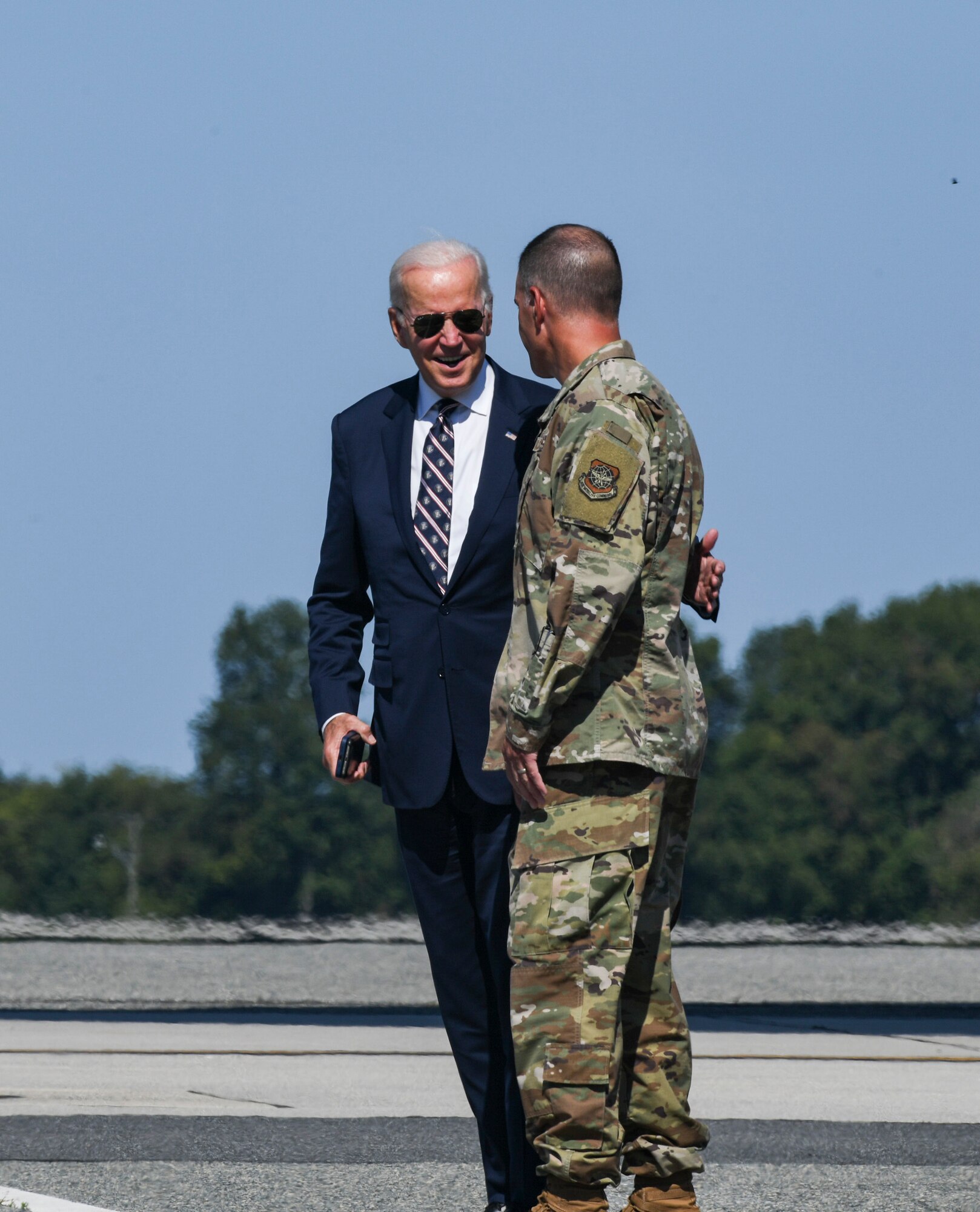 U.S. President Joe Biden, left, walks towards Marine One, accompanied by Col. Matt Husemann, 436th Airlift Wing commander, at Dover Air Force Base, Delaware, while enroute to Wilmington, Del., Sept. 9, 2022.