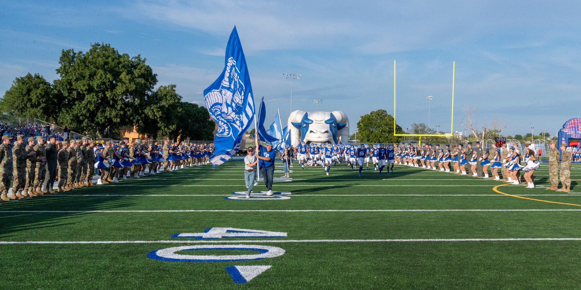 Members from Laughlin Air force Base attend military appreciation night for the homecoming game at Del Rio high school, on Sept. 9, 2022. For Military appreciation night, members from the base led the team out to start the night before Del Rio played their game. (U.S. Air Force photo by Senior Airman Nicholas Larsen)