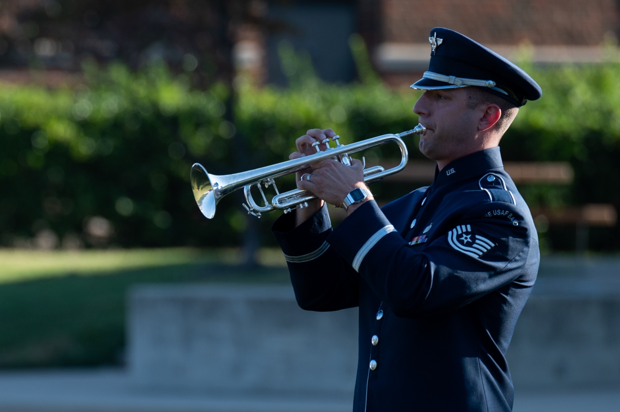 TSgt Aaron Lovelady of The United States Air Force Band plays taps during the 9/11 Remembrance Ceremony at Joint Base Anacostia-Bolling, Washington, D.C., Sept. 9, 2022. The annual event is held in honor of those who lost their lives during the terrorist attacks at the World Trade Center and Pentagon on Sept. 11, 2001, and in remembrance of those who responded. (U.S. Air Force photo by Kristen Wong)