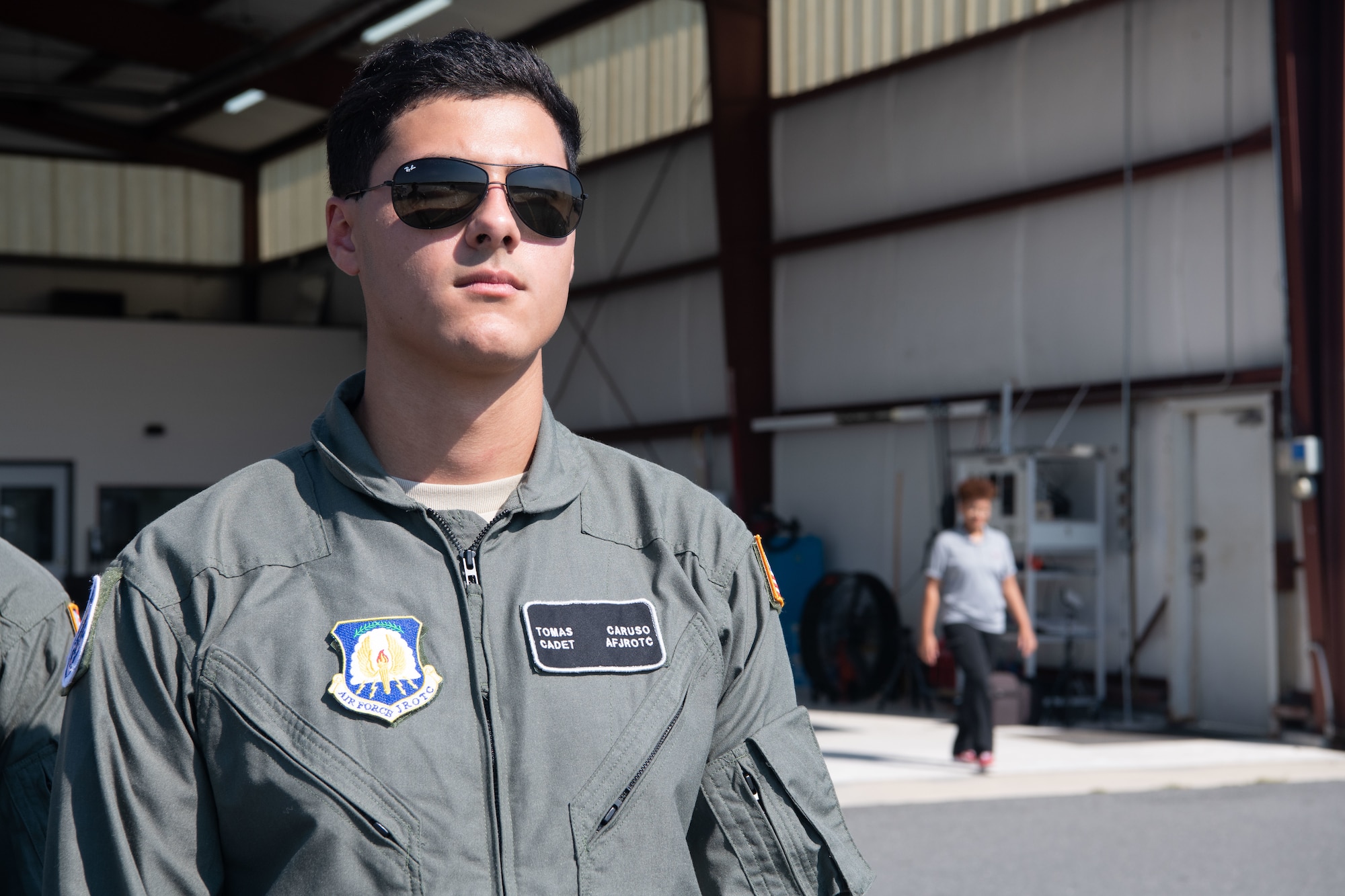 Air Force Cadet Tomas Caruso, watches the flight line at Salisbury, Maryland, August 10, 2022. Some of the cadets who attended the 8 week camp to earn their private pilots license never flew until they took a plane to the camp itself.