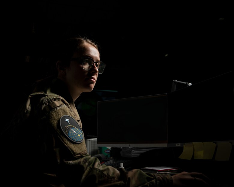 U.S. Space Force 2nd Lt. Rebecca Hetrick, 2nd Space Operations Squadron satellite vehicle operator, monitors the health of a Global Positioning System satellite at Schriever Space Force Base, Colorado, Jan. 25, 2022. Hetrick was the crew expert on vehicle state of health and bus hardware configuration. (This photo has been altered for security purposes.) (U.S. Space Force photo by Lekendrick Stallworth)