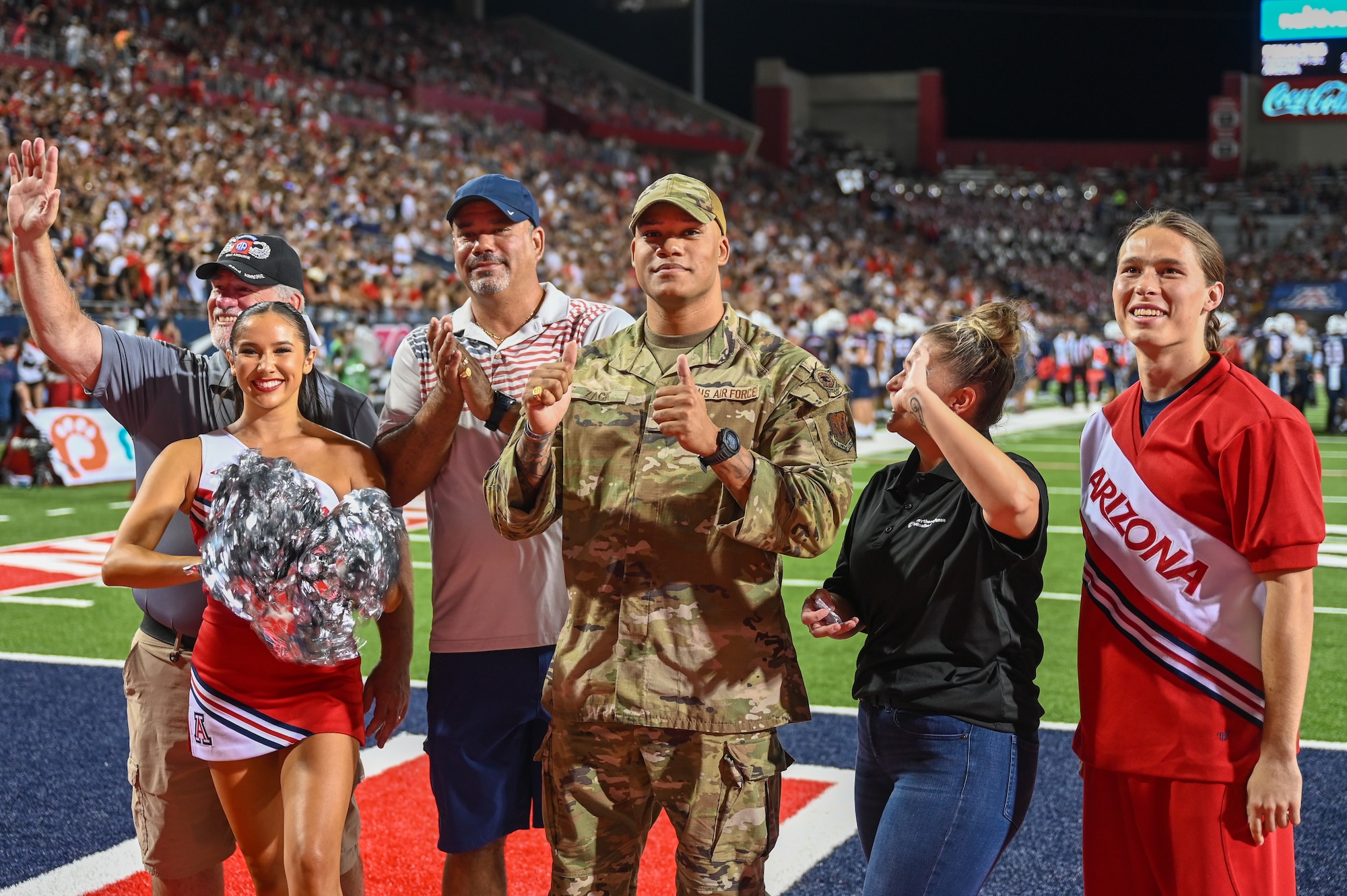 A photo of an Airmen being recognized.