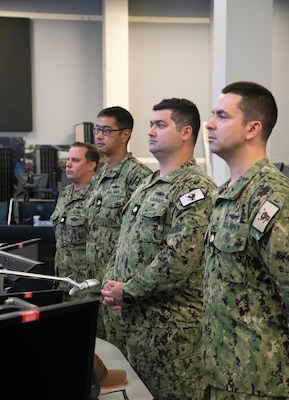 Navy Reservists attached to U.S. Naval Forces Central Command (NAVCENT) listen as Rear Adm. Robert C. Nowakowski, Reserve vice commander, U.S. Naval Forces Central Command, gives opening remarks to Reserve Sailors during a maritime operations center exercise in Norfolk. The maritime operations center exercise, comprised of 10 units, is a training exercise by Reserve Sailors, for Reserve Sailors to strategically align with mission requirements to support the fleet in the four lines of effort which are design, train, mobilize and develop. (U.S. Navy photo by Mass Communication Specialist 1st Class Helen Brown)