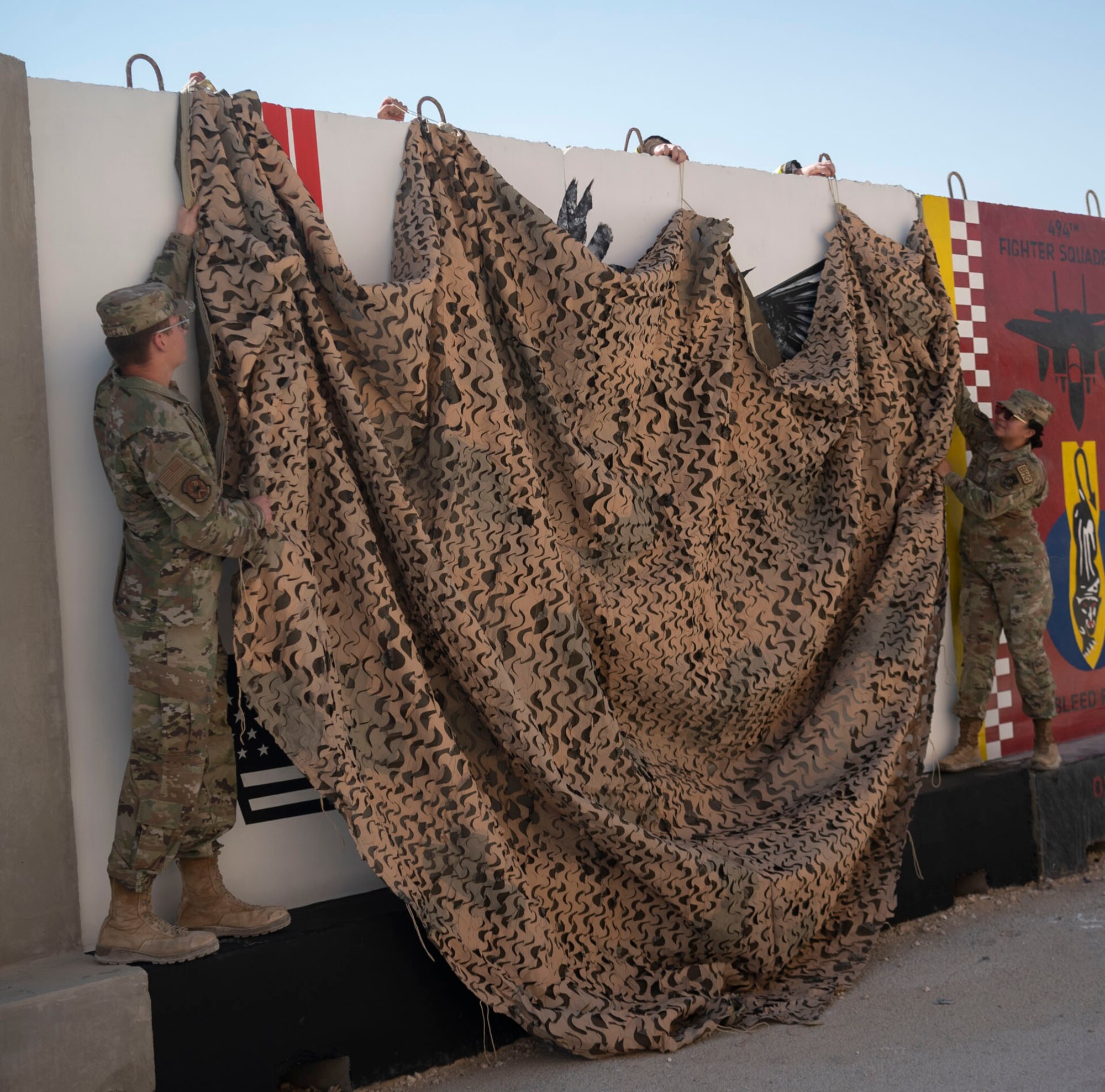 The 332d Air Expeditionary Wing honors those lives lost during the September 11 terrorist attacks in 2001. The 332d AEW held a 24 hour stair climb, the “Run to Remember” 5k, an unveiling of a 9/11 themed T-wall, Emergency Services interactive display, a flyover, cookout, 9/11 themed movie night and a memorial ceremony that showed a screening of a documentary  showcasing the sequence of events during the attacks. (U.S. Air Force photo by Tech. Sgt. Jeffery Foster)