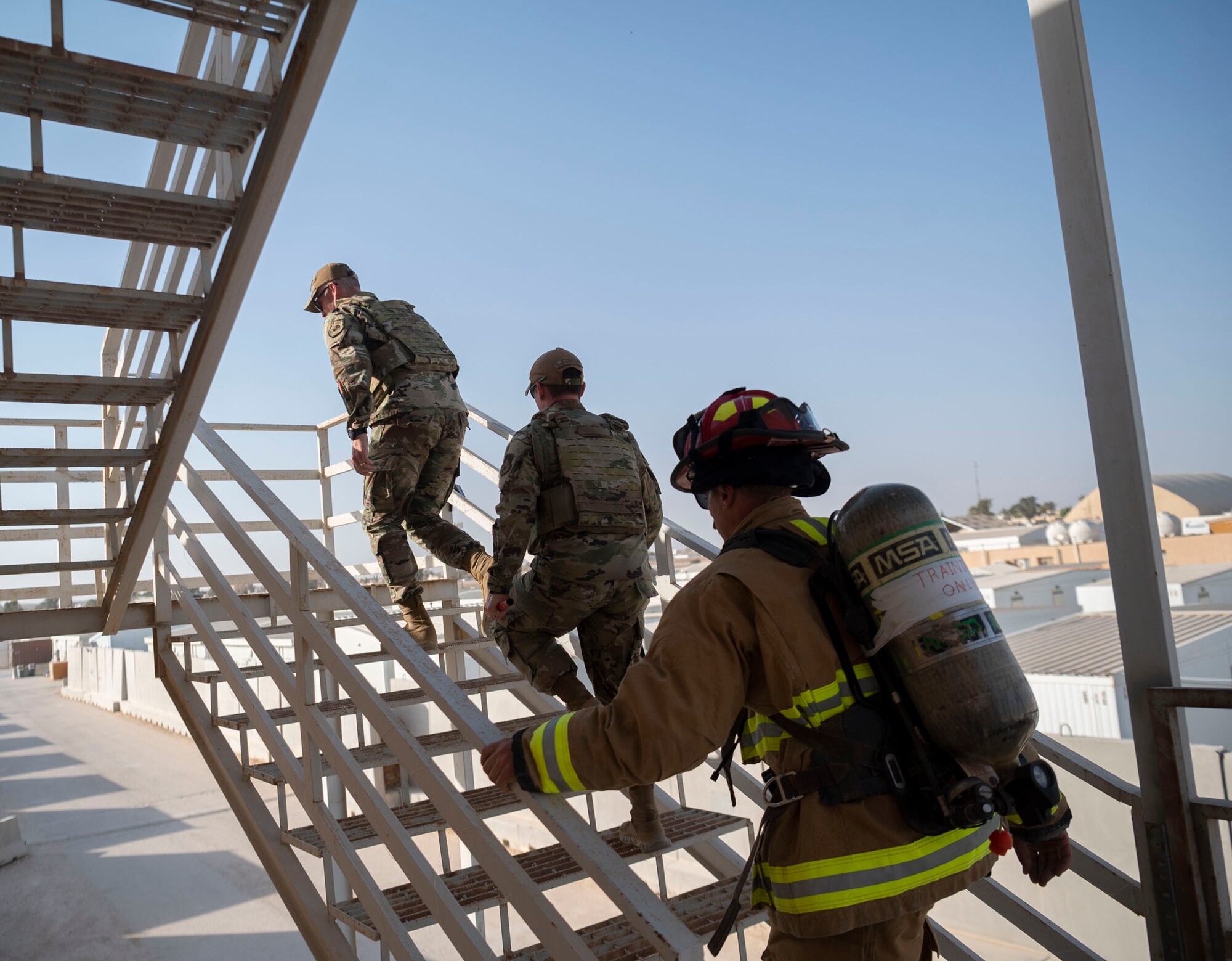 The 332d Air Expeditionary Wing honors those lives lost during the September 11 terrorist attacks in 2001. The 332d AEW held a 24 hour stair climb, the “Run to Remember” 5k, an unveiling of a 9/11 themed T-wall, Emergency Services interactive display, a flyover, cookout, 9/11 themed movie night and a memorial ceremony that showed a screening of a documentary  showcasing the sequence of events during the attacks. (U.S. Air Force photo by Tech. Sgt. Jeffery Foster)