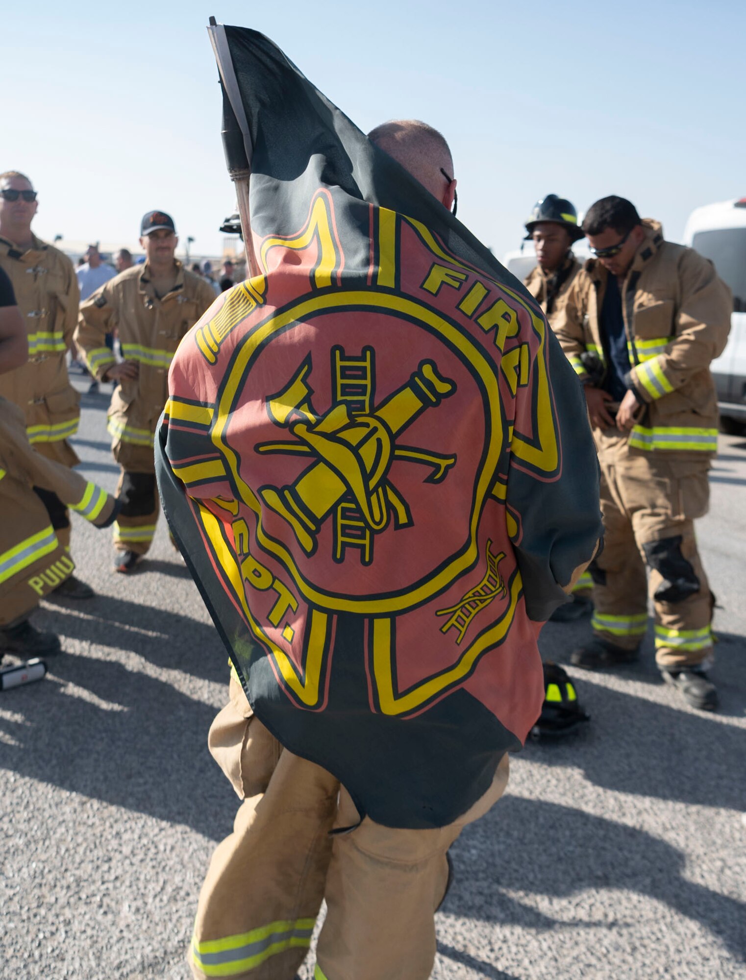 The 332d Air Expeditionary Wing honors those lives lost during the September 11 terrorist attacks in 2001. The 332d AEW held a 24 hour stair climb, the “Run to Remember” 5k, an unveiling of a 9/11 themed T-wall, Emergency Services interactive display, a flyover, cookout, 9/11 themed movie night and a memorial ceremony that showed a screening of a documentary  showcasing the sequence of events during the attacks. (U.S. Air Force photo by Tech. Sgt. Jeffery Foster)